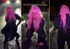 Bebe Rexha publikon video duke kërcyer dhe bërë lëvizje provokuese jashtë në shi