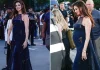 Anne Hathaway shfaq barkun e rrumbullakosur me një fustan blu të errët në premierën e The Odyssey në Paris